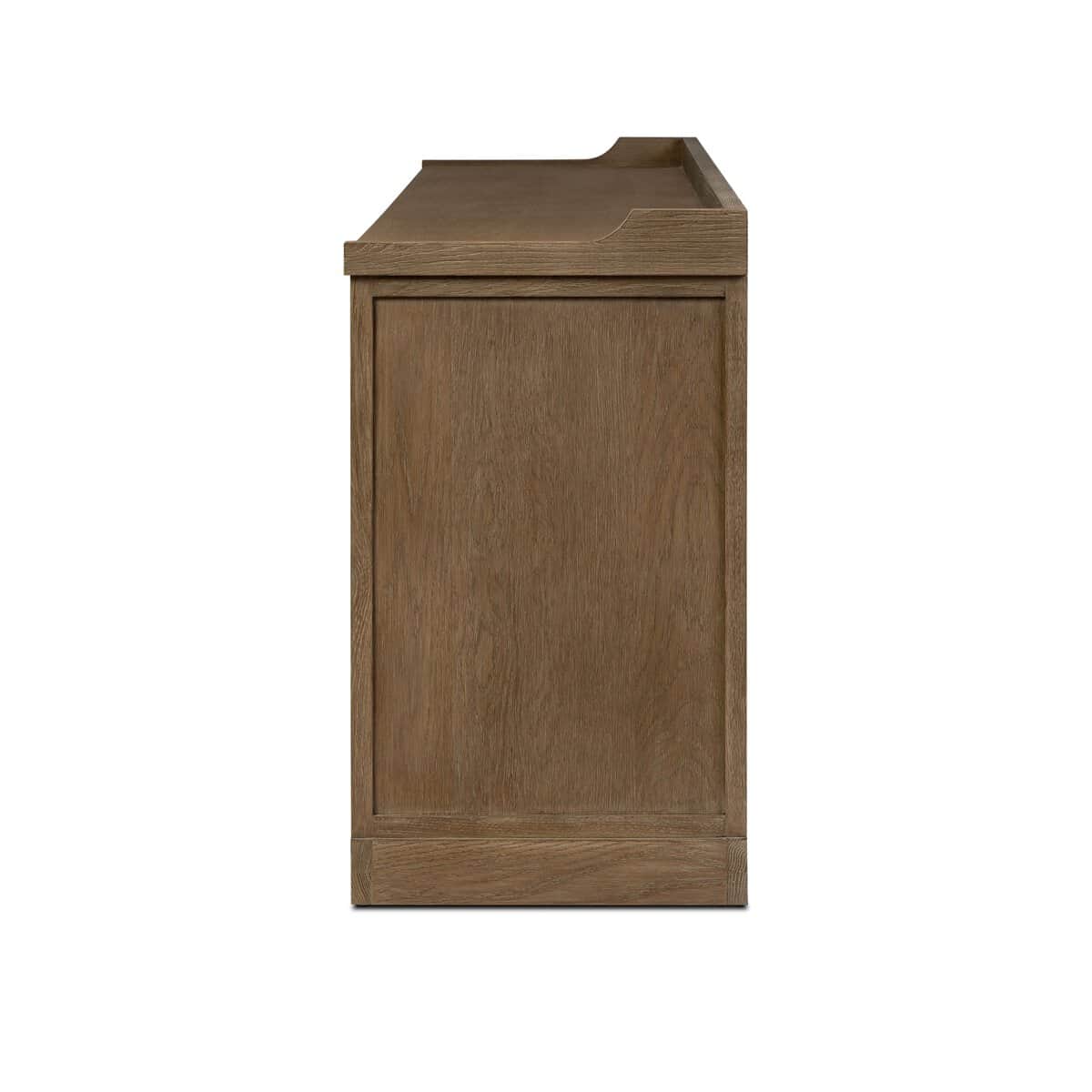 A side view of a modern wood dresser featuring a natural light brown finish, a framed side panel, an… — 3D model