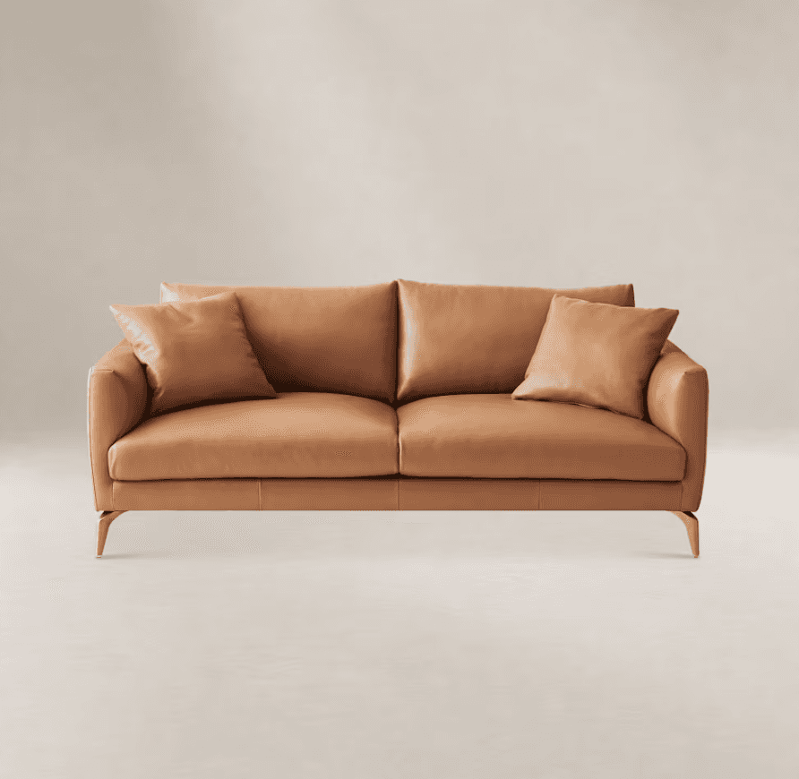 A modern two-seater sofa featuring clean lines and upholstered in smooth tan or cognac-colored leath… — 3D model