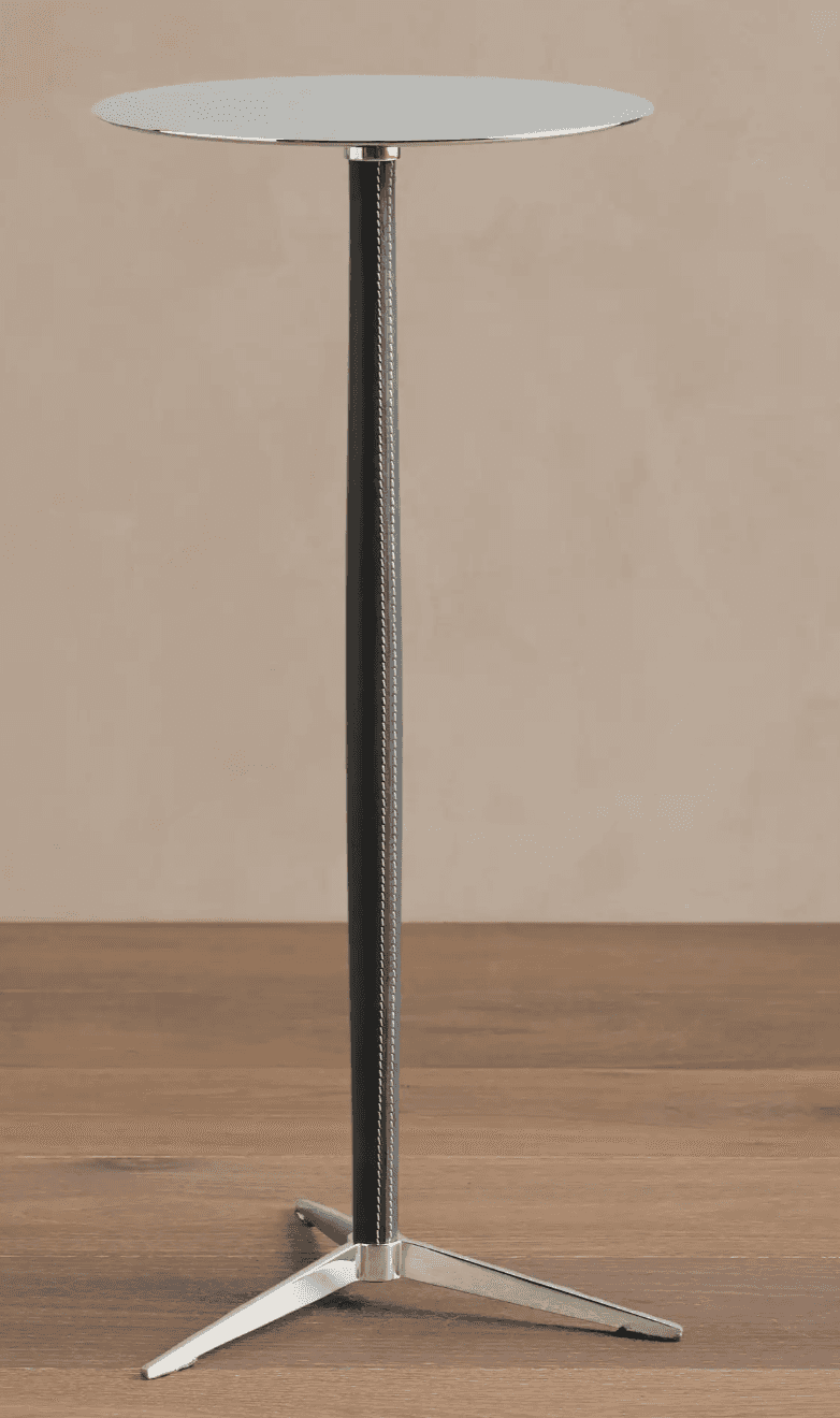 A tall, slender side table with a circular, reflective top. The central column is covered in dark ma… — free STL 3D model