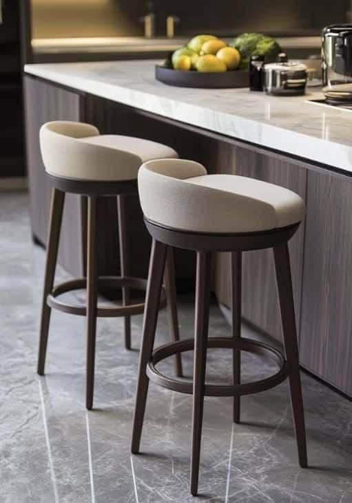 A contemporary bar stool featuring a comfortable upholstered seat and a low, curved backrest, suppor… — 3D model