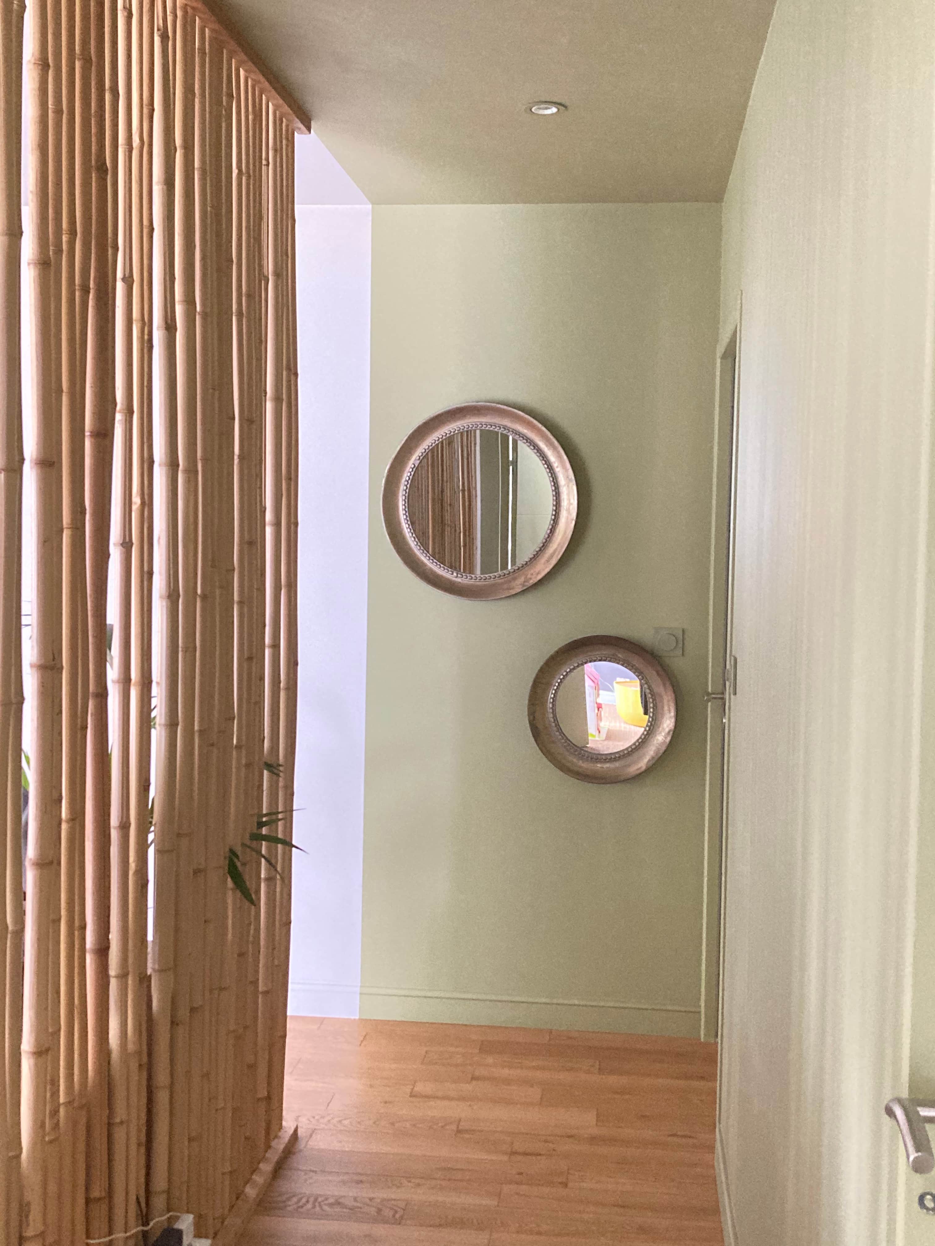 A vertical panel constructed from numerous individual bamboo poles, arranged closely together and co… — 3D model