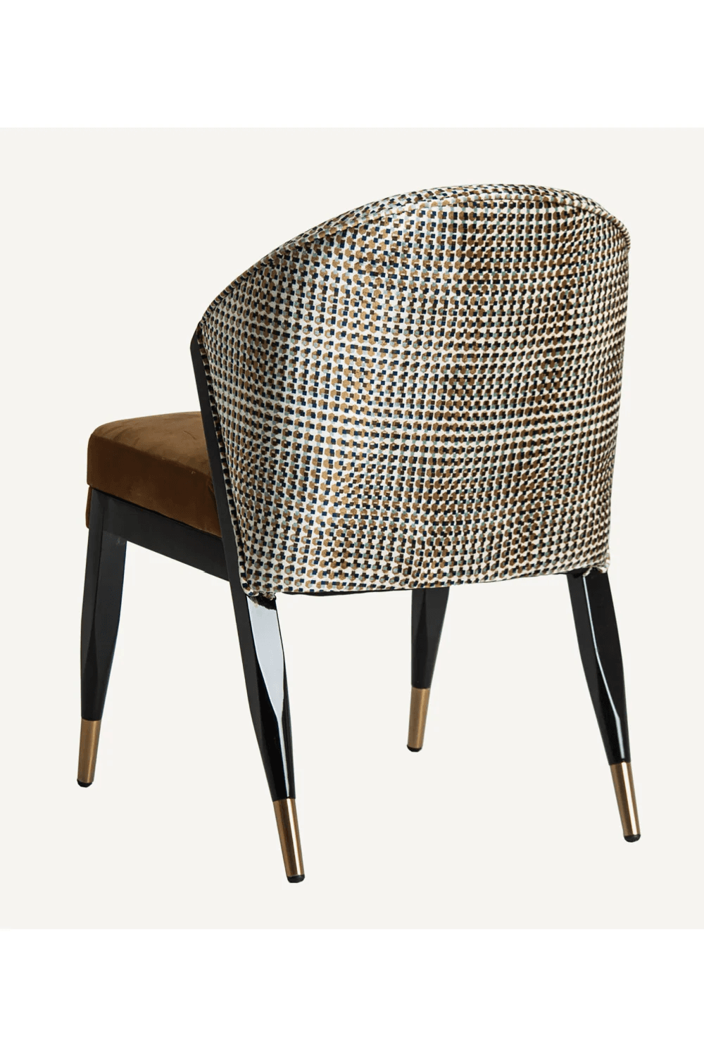 An armchair with a curved backrest upholstered in a patterned fabric, and a seat upholstered in brow… — free OBJ 3D model
