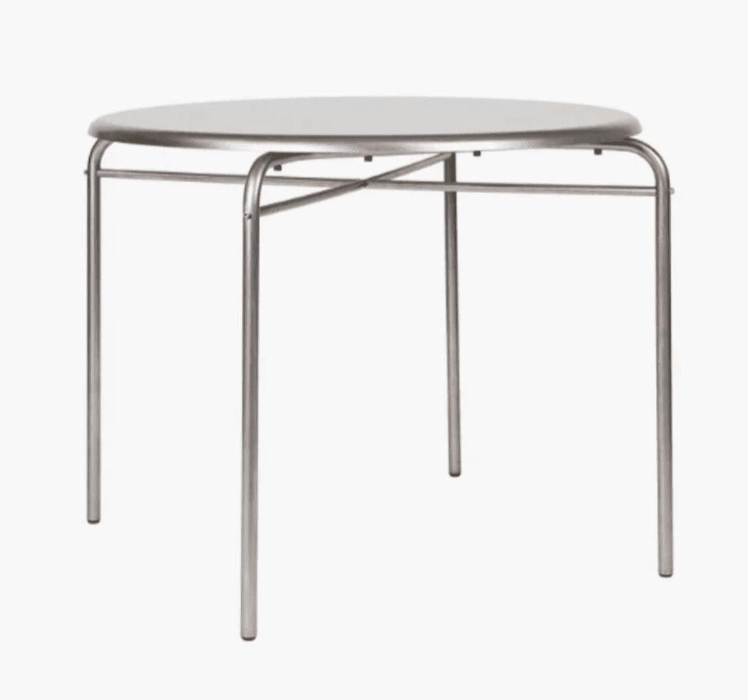 A modern round side table featuring a light gray or white tabletop supported by a tubular metal fram… — free STL 3D model
