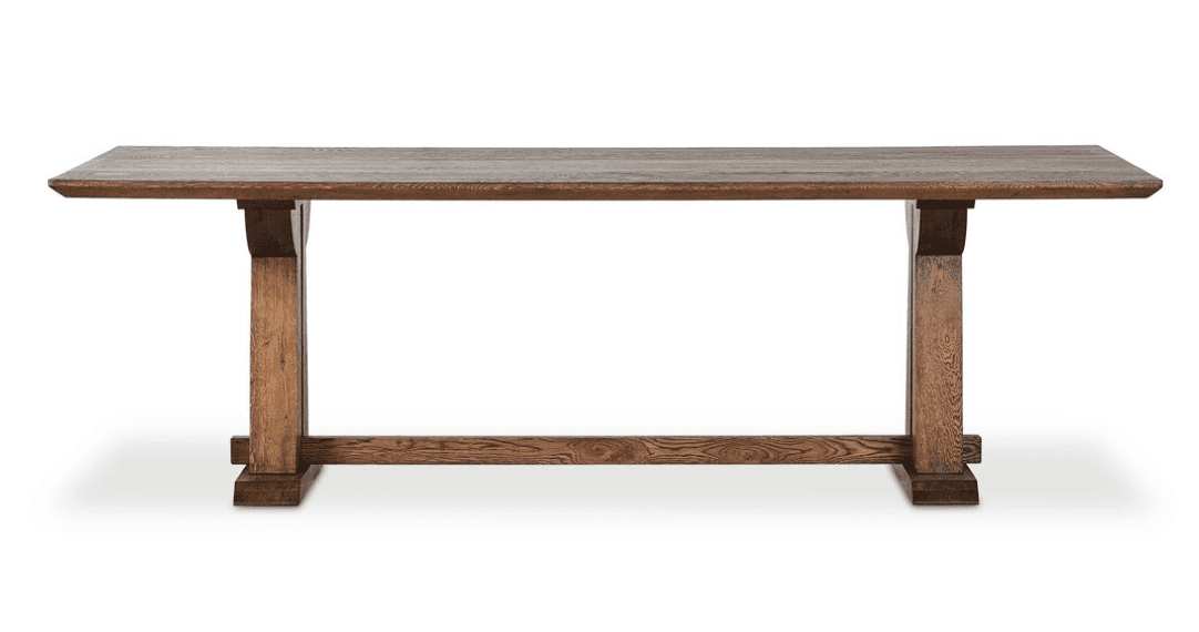 A long, rectangular wooden table with a sturdy, thick top and two trestle-style bases connected by a… — 3D model