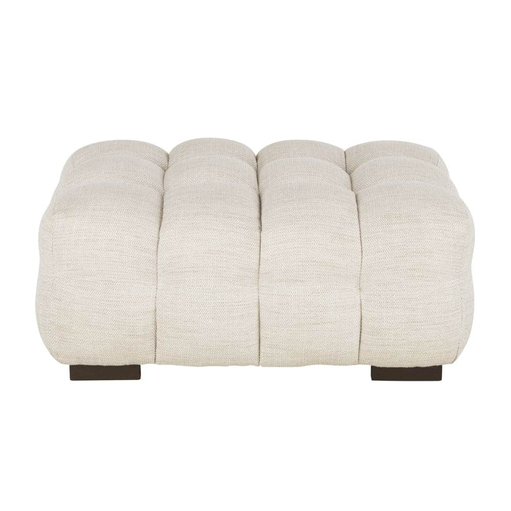 A rectangular, tufted ottoman with a textured cream-colored upholstery. The tufting creates a series… — 3D model