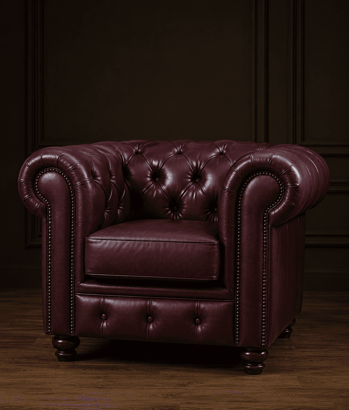 A classic Chesterfield-style armchair upholstered in deep red or burgundy leather, featuring charact… — 3D model