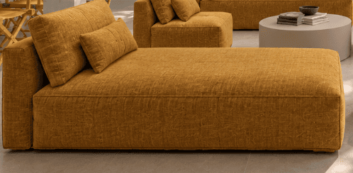 A modern chaise lounge upholstered in a textured mustard yellow fabric, featuring a fixed backrest a… — free STL 3D model