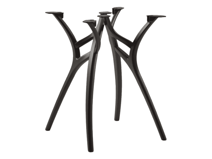 A four-legged, sculptural table base designed to support a tabletop. The legs have an organic, flowi… — free GLTF 3D model