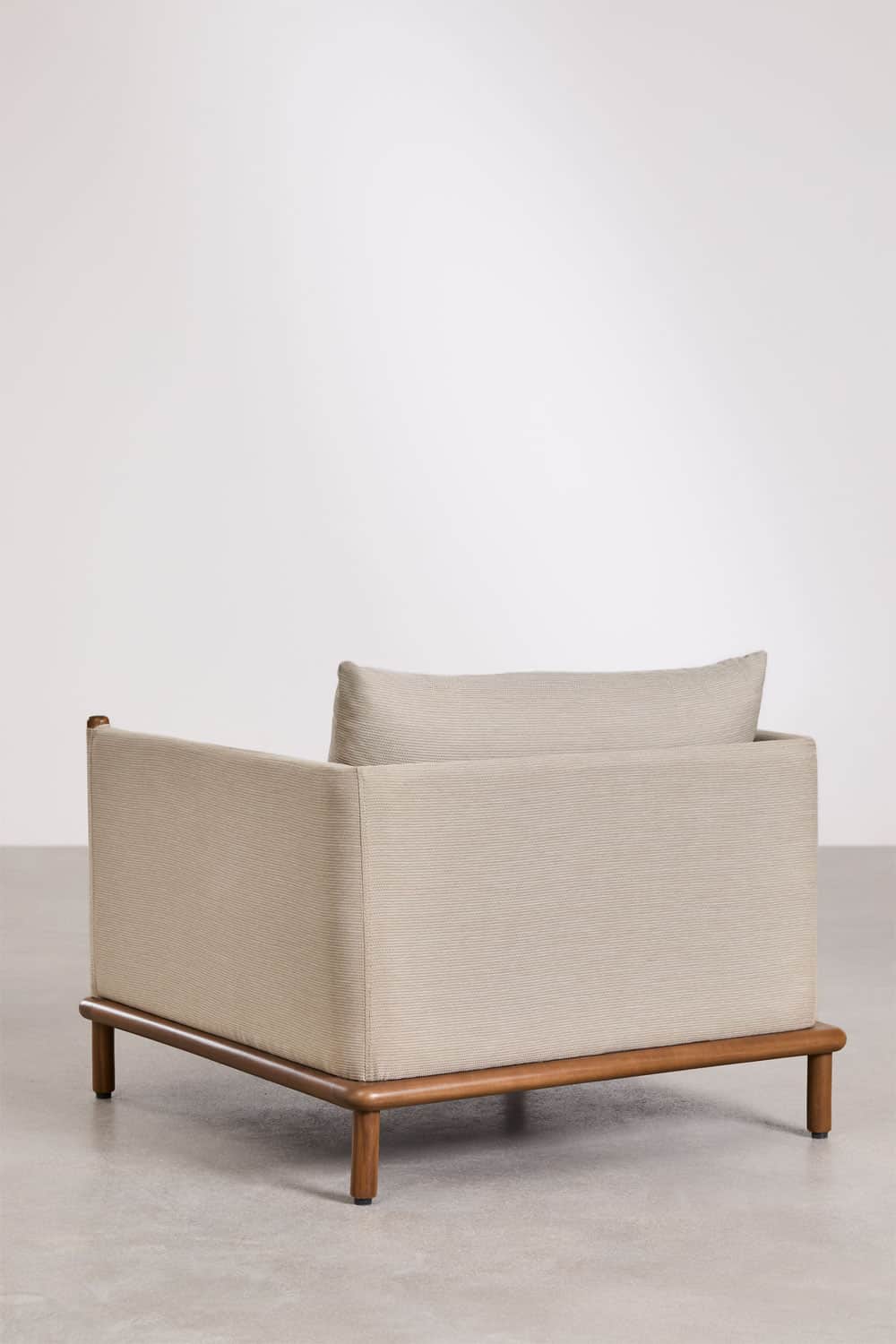 A modern lounge chair featuring a plush, upholstered body in a light beige/grey fabric set upon an e… — 3D model