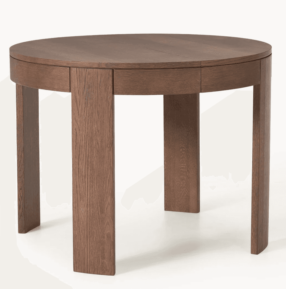 A round dining table crafted from dark oak wood, featuring a substantial tabletop with a visible sea… — 3D model