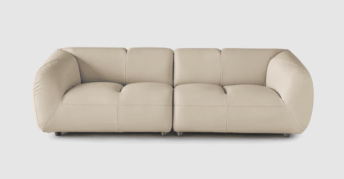 A contemporary four-seat sofa with a low profile and rounded arms. The sofa is upholstered in a ligh… — free FBX 3D model