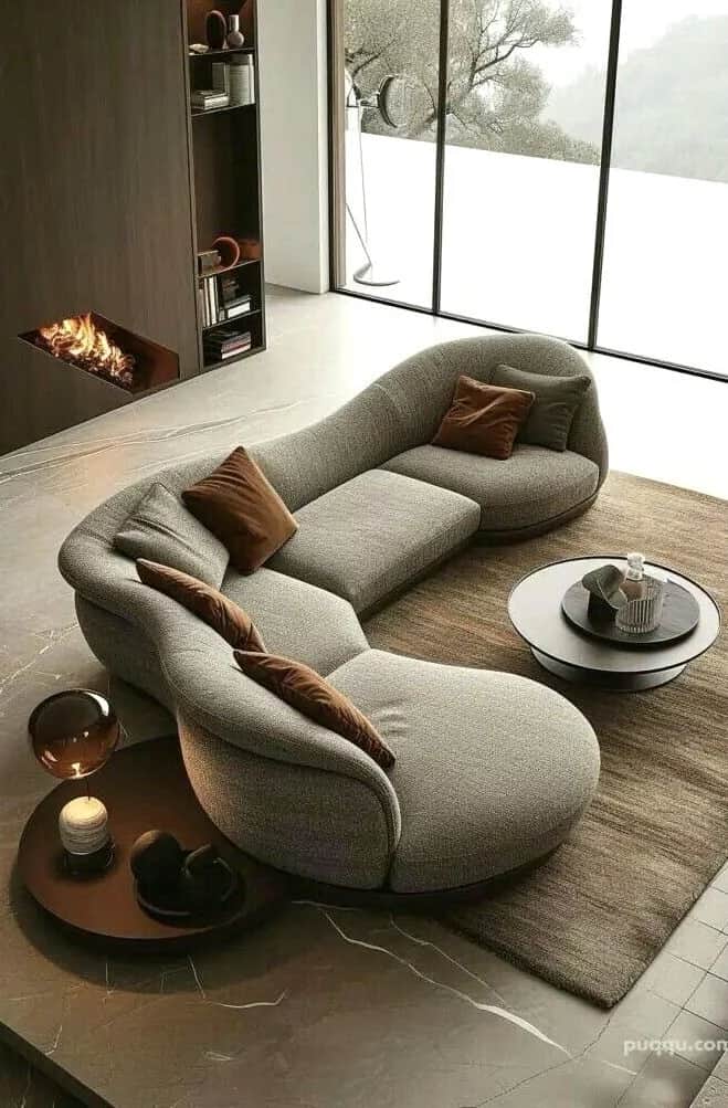 A contemporary, organically shaped sectional lounge sofa upholstered in a light grey textured fabric… — 3D model