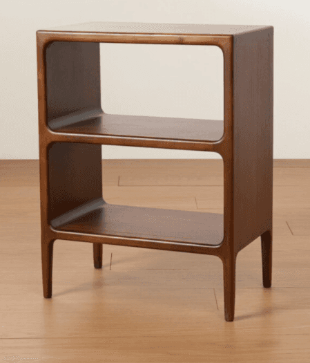 A wooden end table with a minimalist design. It features two open shelves and a smooth, curved frame… — 3D model