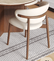 A contemporary armless chair featuring a gently curved, upholstered seat and a separate, distinctive… — free GLB 3D model