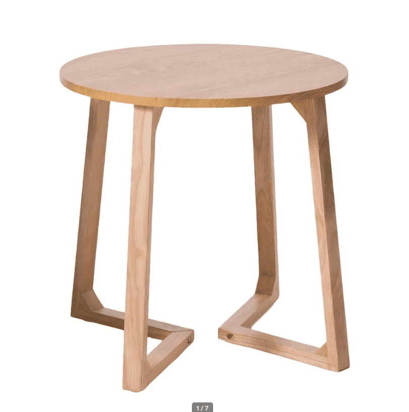 A small, round-topped side table constructed from light-toned solid wood, featuring a minimalist des… — 3D model