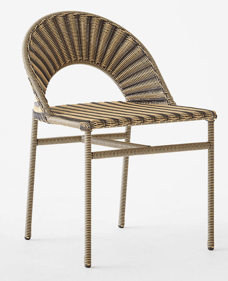 A side chair with a woven rattan seat, back, and legs. The backrest curves upwards and over the seat… — free FBX 3D model