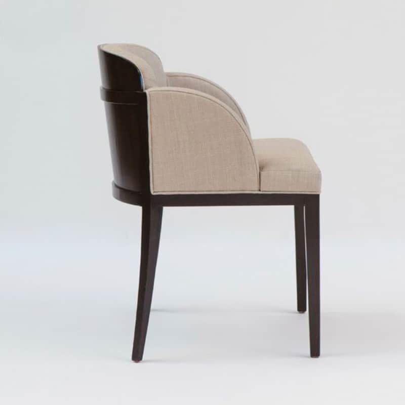 An upholstered armchair featuring a curved backrest and integrated arms, set on a dark wood frame wi… — 3D model