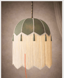 A decorative pendant light featuring a matte green dome shade with a scalloped edge, adorned with lo… — 3D model