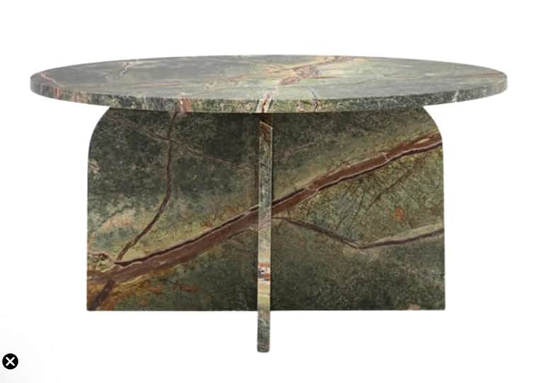 A monolithic coffee table crafted entirely from green marble with distinctive reddish-brown veining.… — 3D model