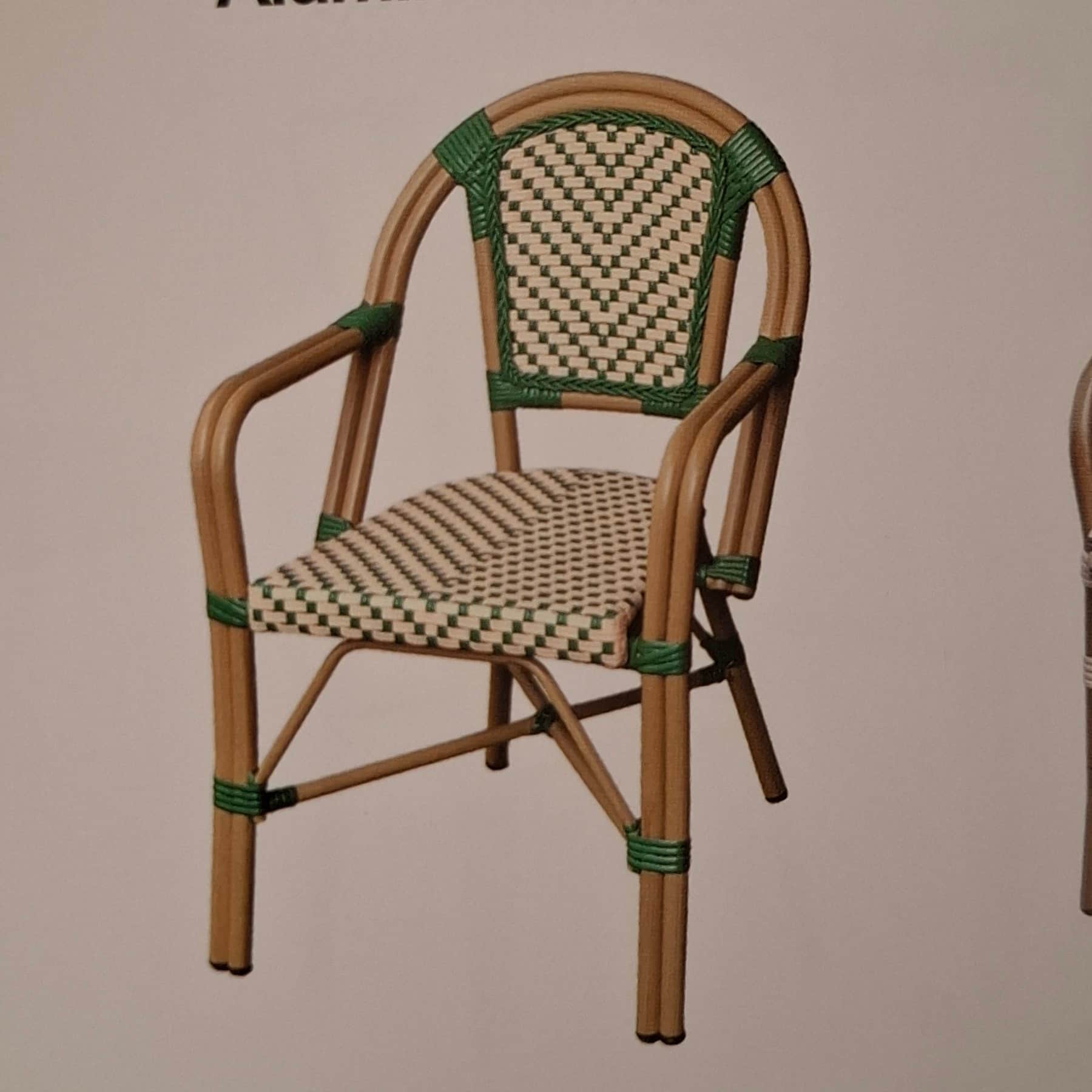 A light brown and green wicker armchair with a curved back and armrests. The seat and back are woven… — free OBJ 3D model