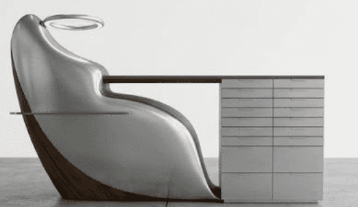 A highly modern and sculptural desk unit featuring an integrated ergonomic chair, a work surface, an… — 3D model