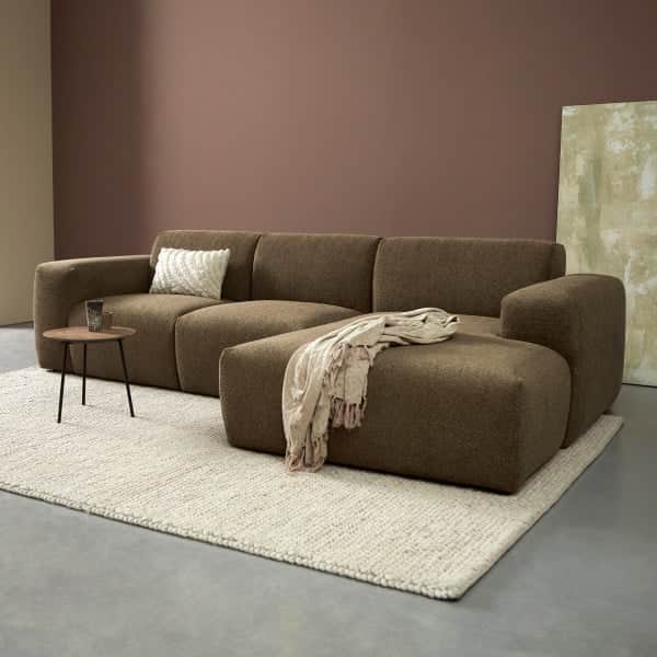 A contemporary modular sectional sofa featuring a chaise lounge, upholstered in a textured brown fab… — 3D model