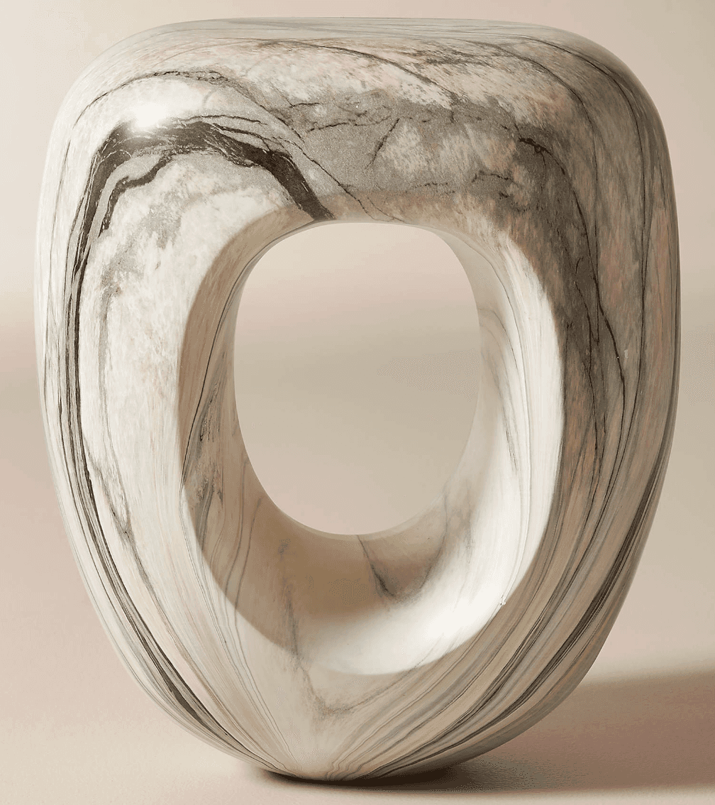 A modern sculptural accent table or stool crafted from a single piece of marble. It features an orga… — 3D model