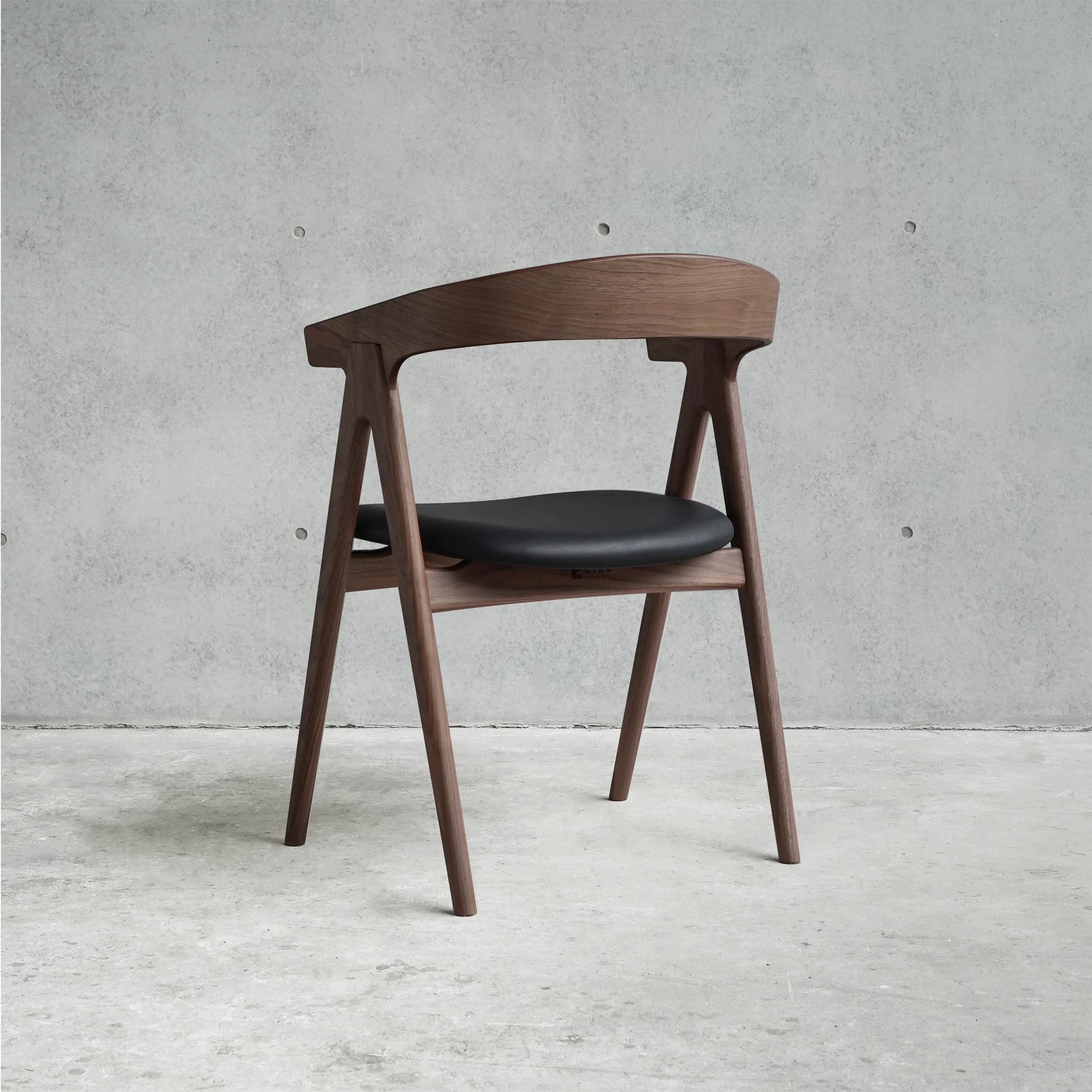 A modern armchair with a curved wooden frame and a black upholstered seat. The chair has four angled… — 3D model