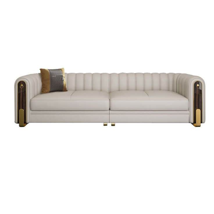 A modern three-seater sofa featuring light-colored upholstery, channel tufting along the backrest an… — 3D model