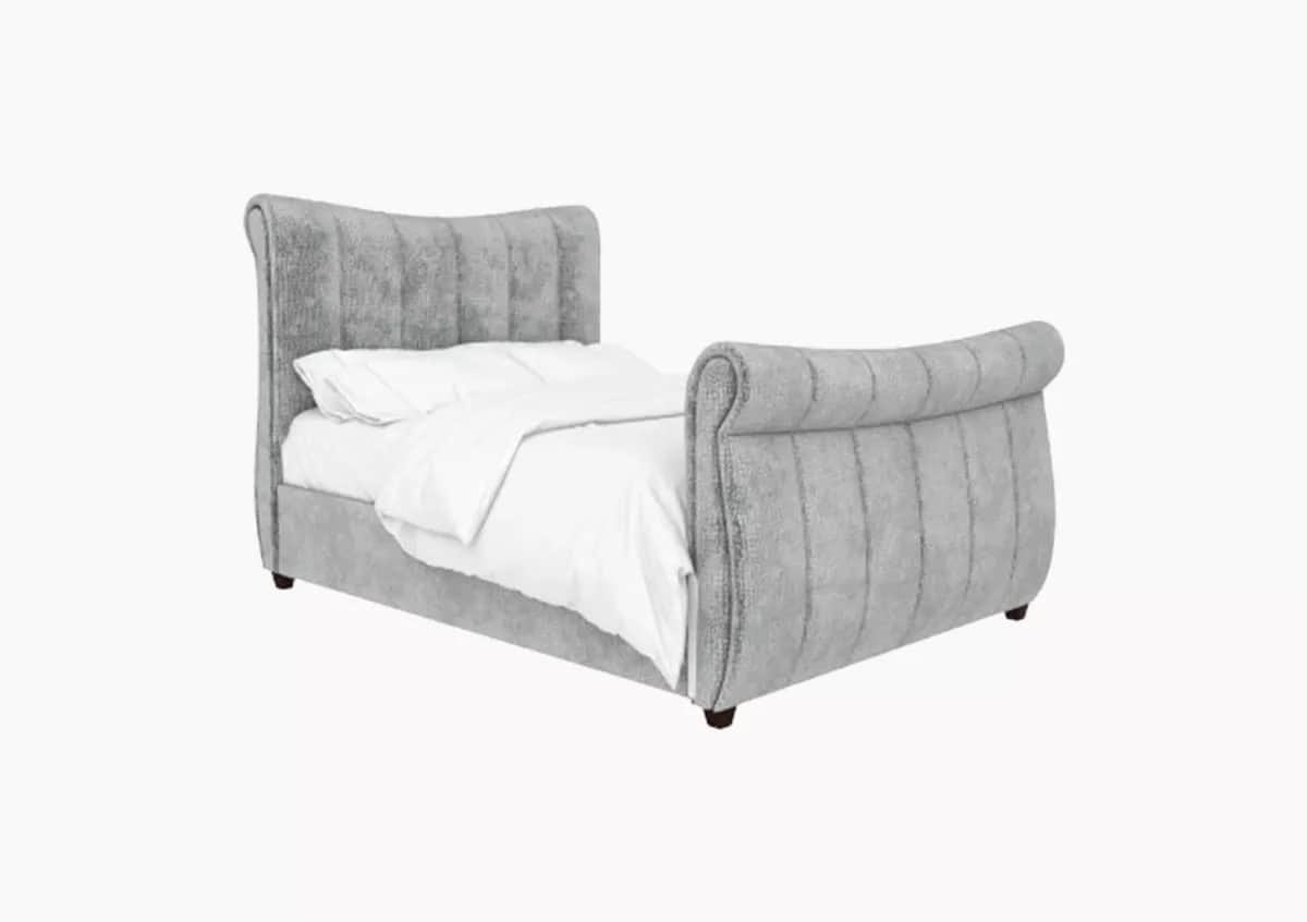 A contemporary upholstered sleigh bed frame featuring a gracefully curved headboard and footboard, b… — 3D model