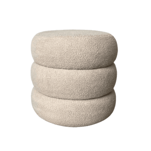 An off-white, cream-colored ottoman featuring a unique design composed of three stacked, rounded, cy… — 3D model