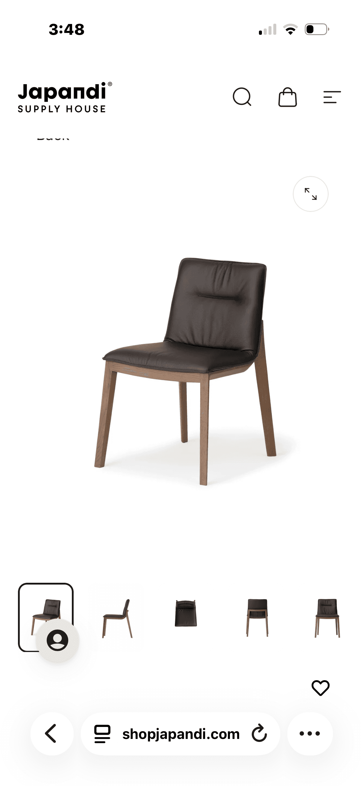 A contemporary armless dining chair featuring a solid wood frame with dark brown leather upholstery… — 3D model
