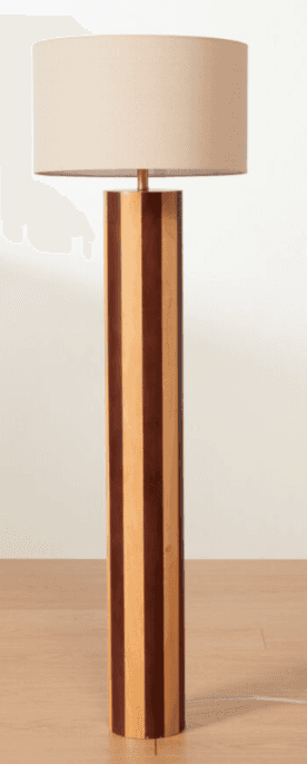 A floor lamp with a cylindrical base constructed from alternating strips of light and dark wood. The… — 3D model