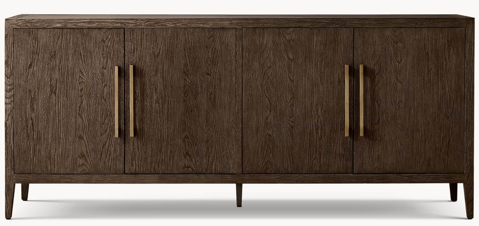 A long, low, dark brown wood cabinet featuring four paneled doors with prominent vertical brass bar… — 3D model