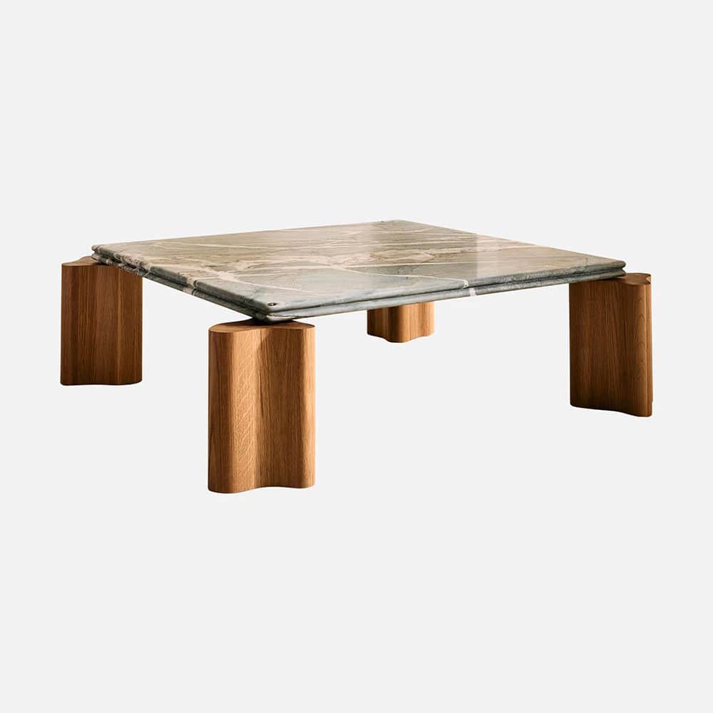 A contemporary coffee table featuring a square top made of veined green marble, supported by four di… — 3D model