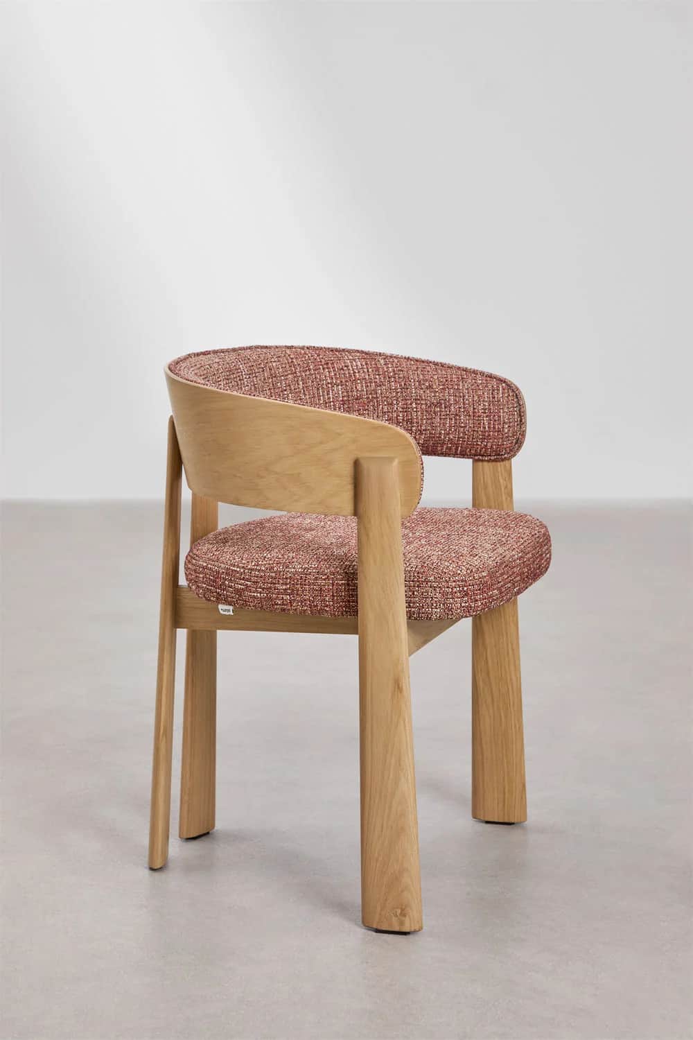 A modern dining armchair featuring a solid light oak wood frame with a curved backrest and upholster… — 3D model