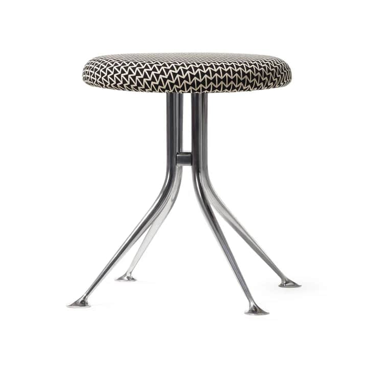 A modern stool with a round, upholstered seat and a distinctive base. The seat features a geometric… — 3D model