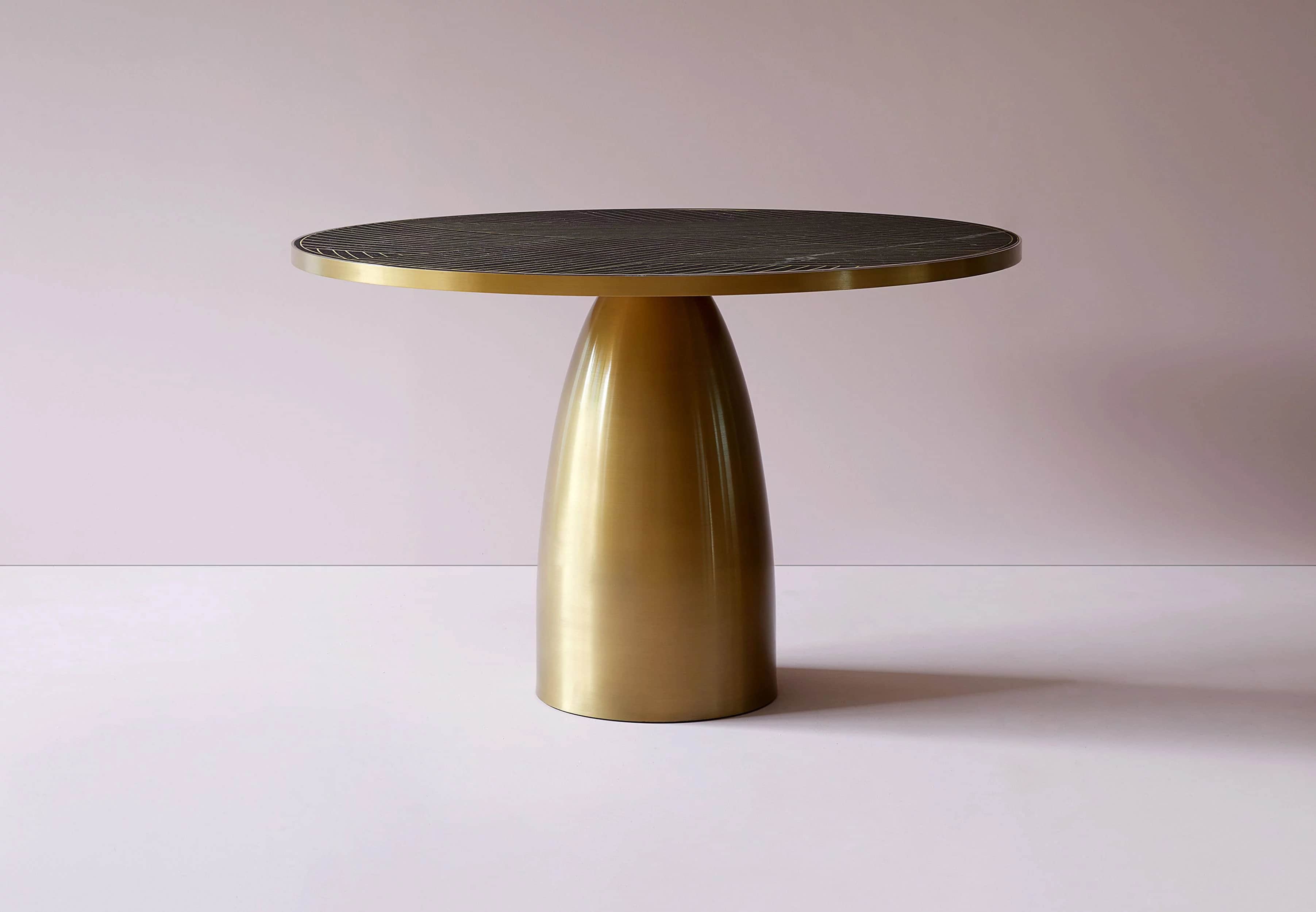 A contemporary side table with a circular top and a single, fluted pedestal base. The tabletop is da… — 3D model