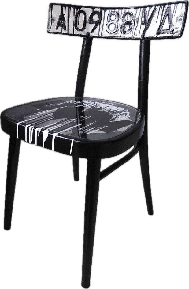 A black chair with a curved backrest adorned with a license plate featuring dripped black paint. The… — 3D model