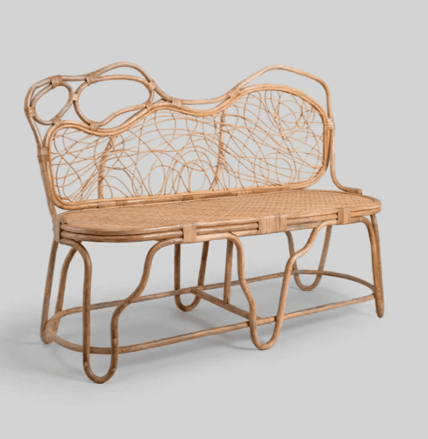 A two-seater bench constructed entirely from rattan. The design features a woven seat and a backrest… — free BLEND 3D model
