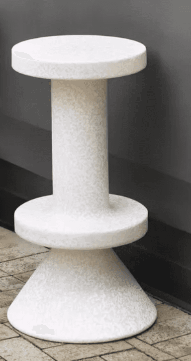 A modern, monochromatic, speckled stool or accent table featuring a cylindrical central column, a ci… — 3D model