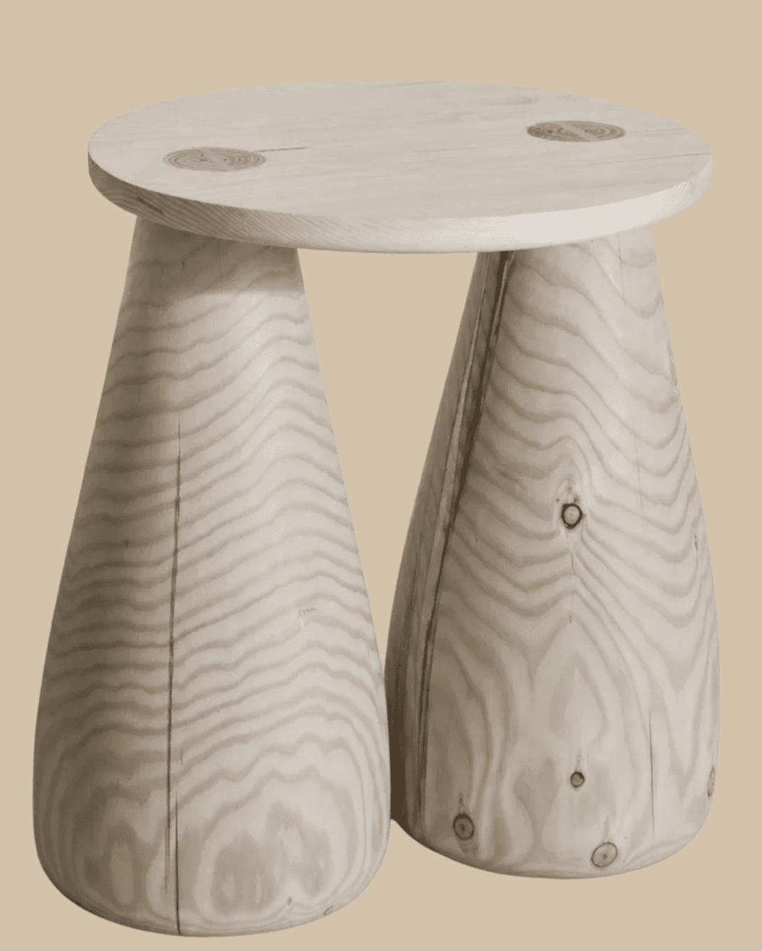A modern sculptural stool made from light-toned wood, featuring a round top surface supported by two… — 3D model