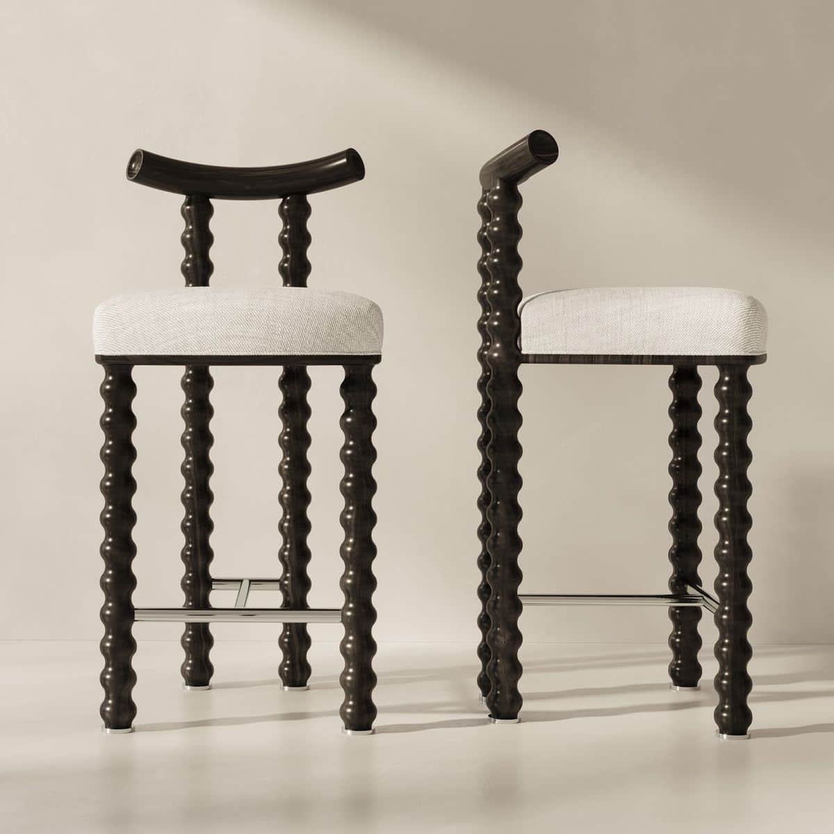 A bar stool with a dark wood frame and a light-colored upholstered seat. The frame features turned w… — 3D model