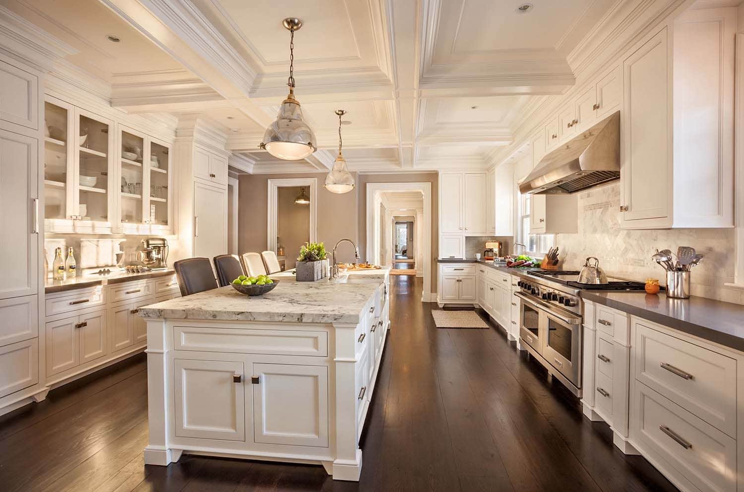 A kitchen island featuring a white painted finish, a granite countertop, and raised panel doors. The… — 3D model