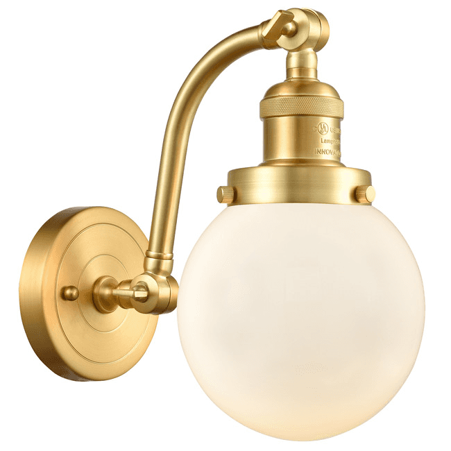A brass wall lamp with an adjustable arm and a frosted glass globe shade. The lamp features a circul… — 3D model