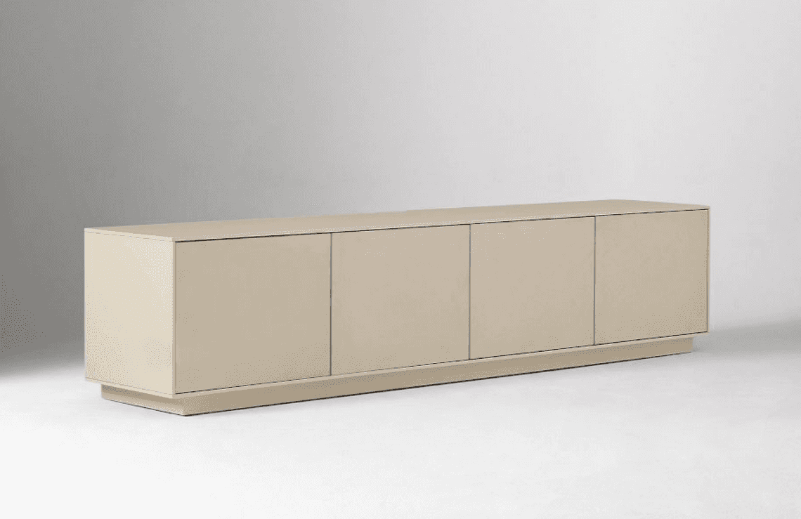 A long, low-profile contemporary sideboard cabinet featuring four handleless doors, finished in a li… — 3D model
