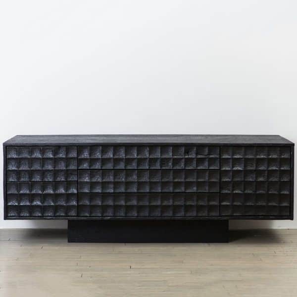 A long, low dresser with a textured front. The front features a repeating geometric pattern of small… — 3D model