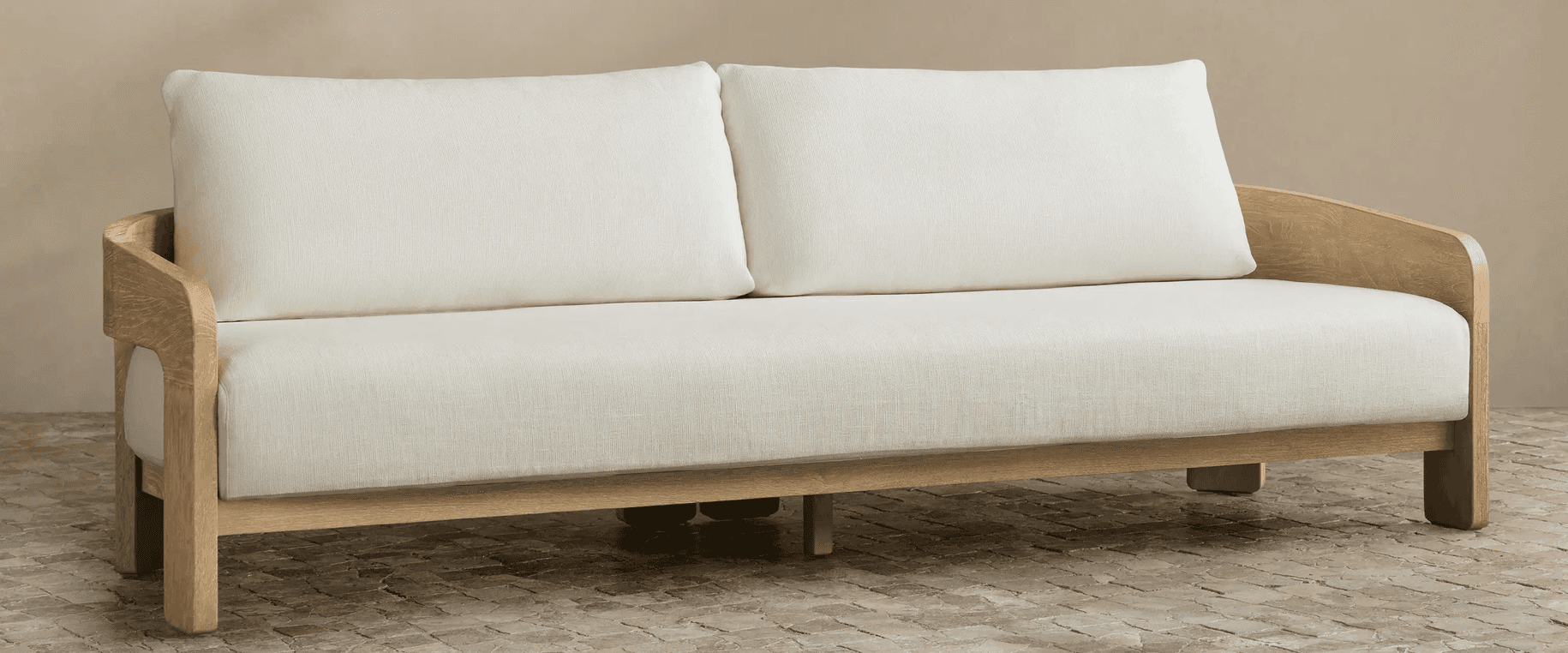A two-seater loveseat featuring a distinct exposed wooden frame made of light-toned oak. It is uphol… — 3D model