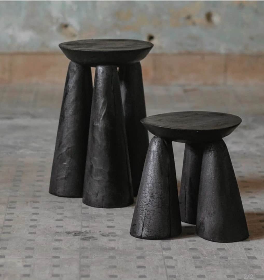 A minimalist stool featuring a circular flat top seat and three robust conical legs, all crafted fro… — 3D model