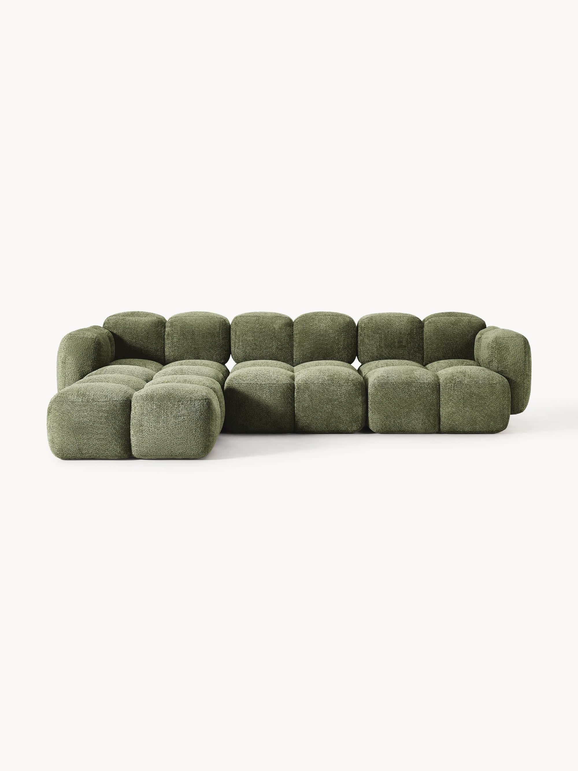 A modular sectional sofa with a low profile. The sofa is composed of individual cubic modules with r… — 3D model